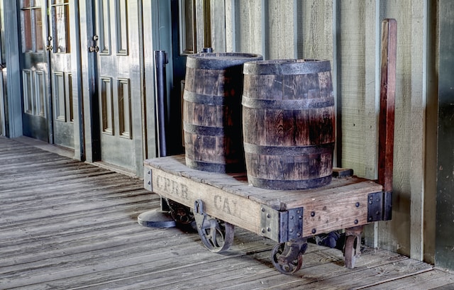 Whiskey barrels on cart